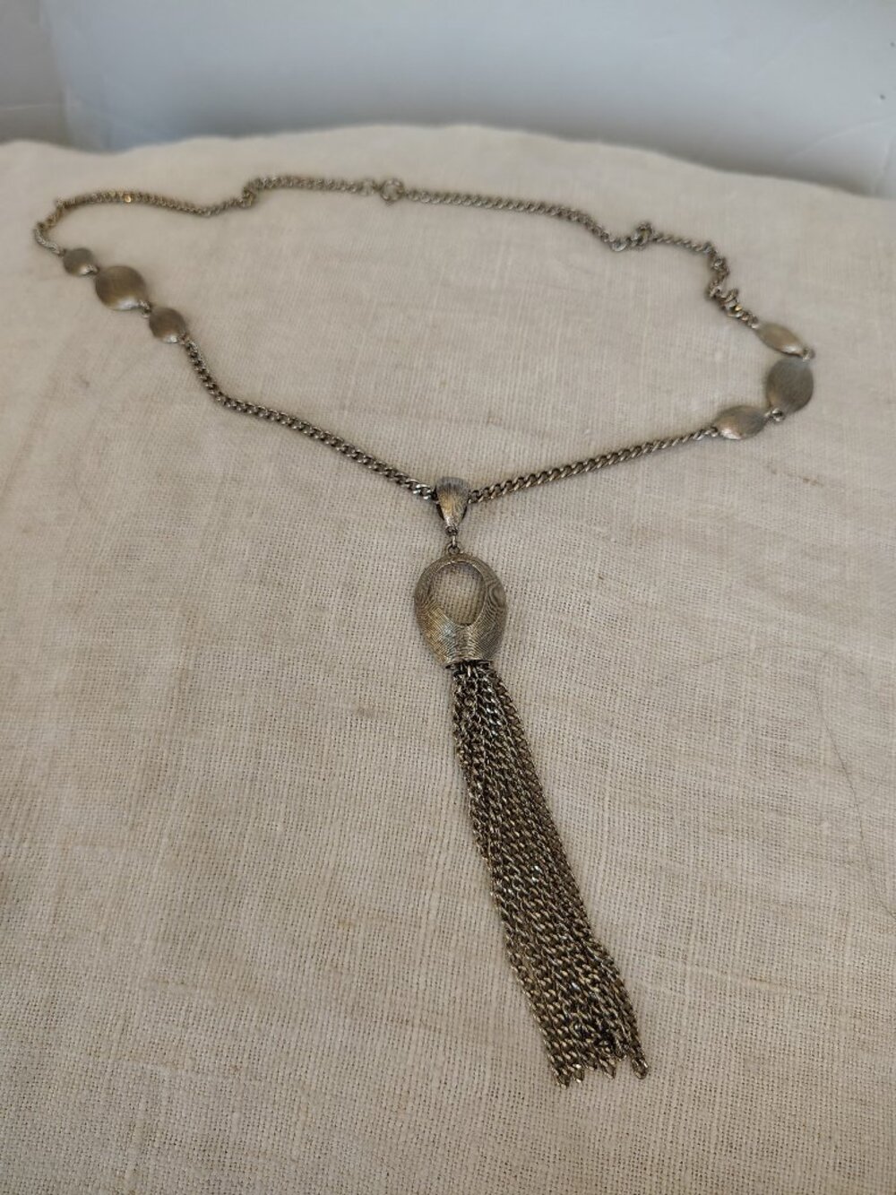 Silver tone Vintage chain necklace with open work pendant and tassel